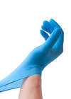 Pulverize o elástico azul descartável livre do produto comestível das luvas do nitrilo